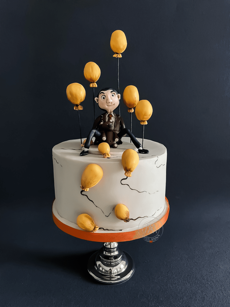 Mr Bean mit Ballonen Geburtstagstorte bestellen